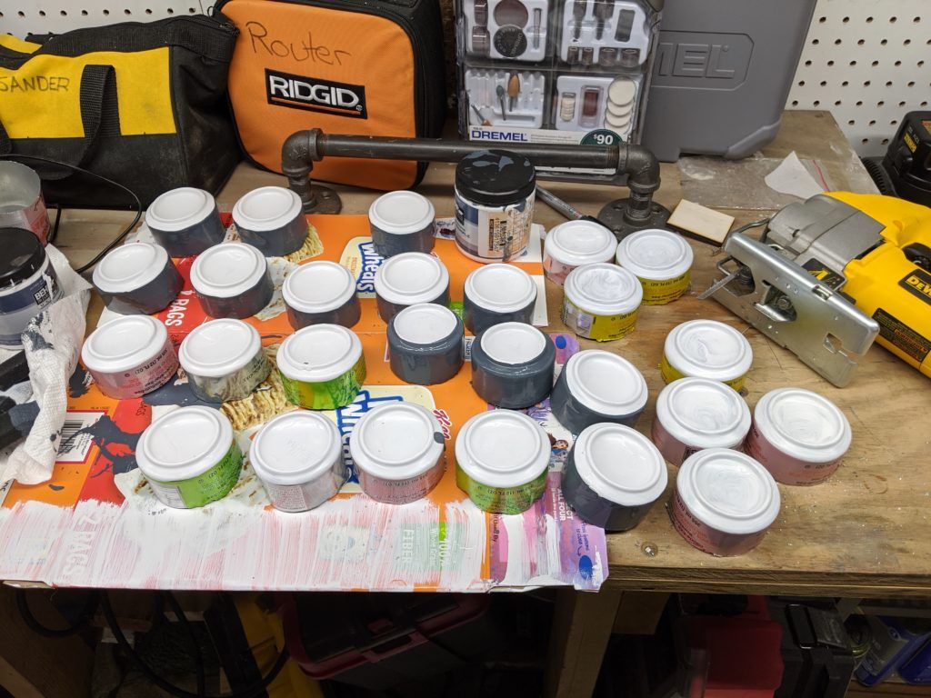 24 aluminum cans turned upside-down and with the bottoms painted white