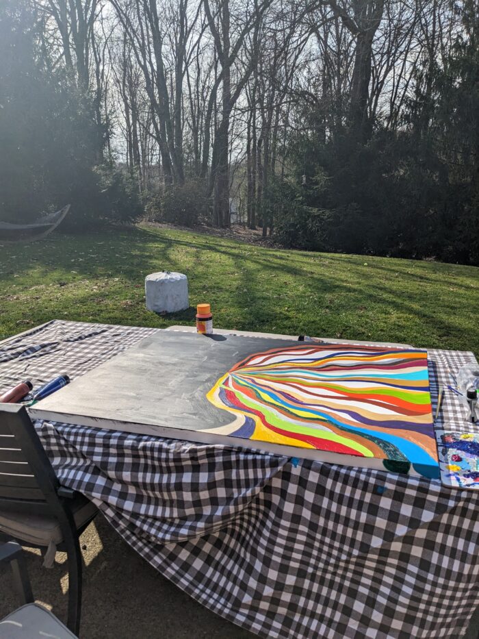 A painting being painted outside