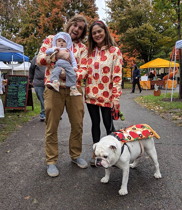 Brad, Melissa, Ella, and Ziggy all dressed up as pizza for Haloween