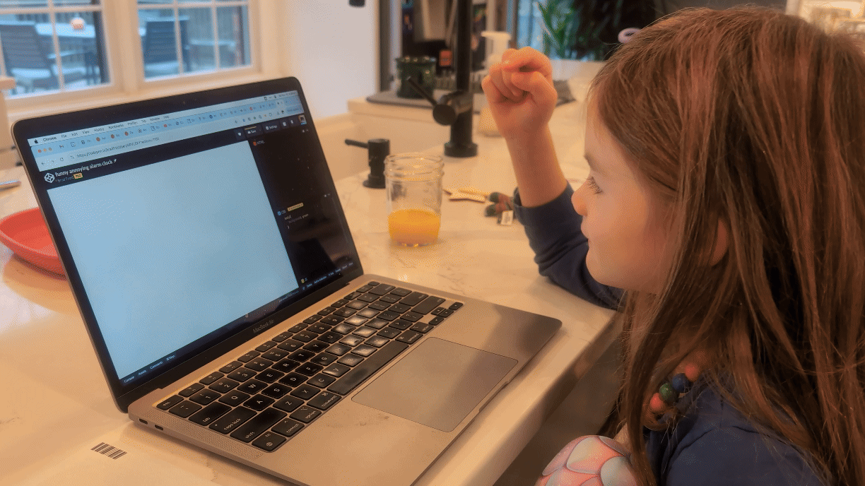 Ella reacting to the browser window change from white to green when she entered the appropriate CSS code.