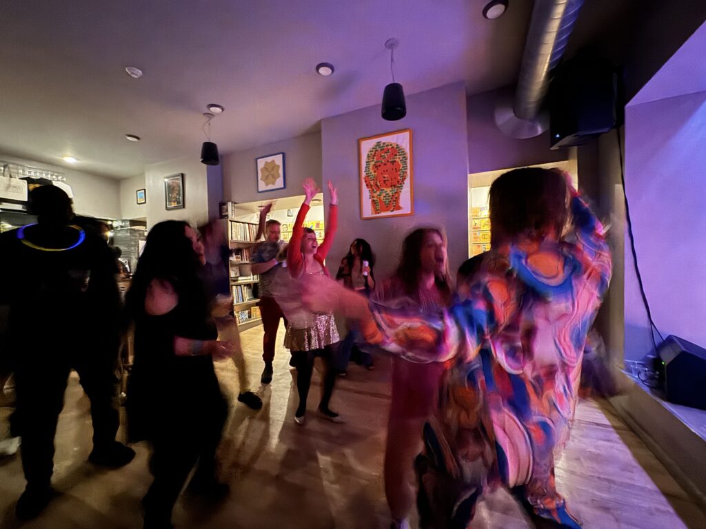 A crowd of people dancing at the Frostapalooza afterparty