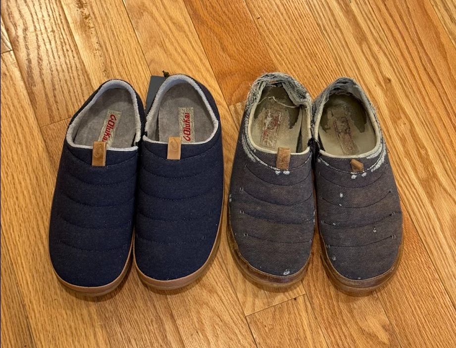 A new pair of Olukai slippers sitting next to a beat-up pair of the exact same slippers beside them.