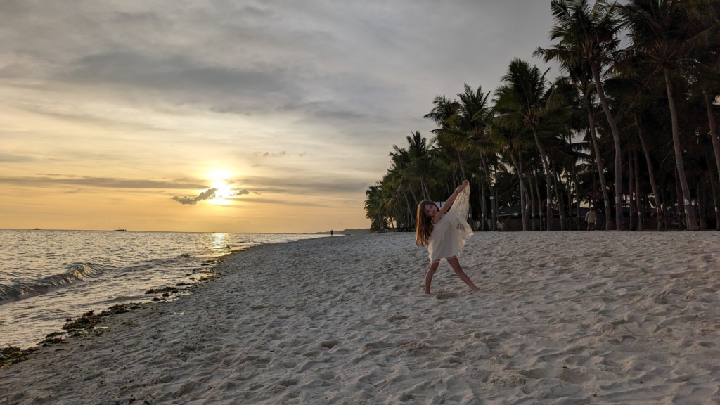 Ella posing against a beautiful sunset in The Philippines